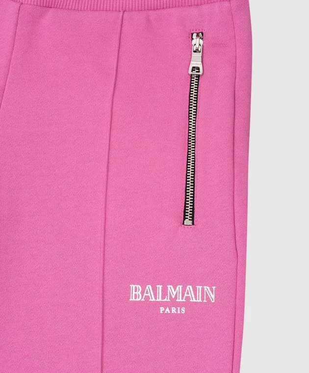 Balmain Pantaloni rosa a zampa da bambino con stampa logo BV6A80Z1753410