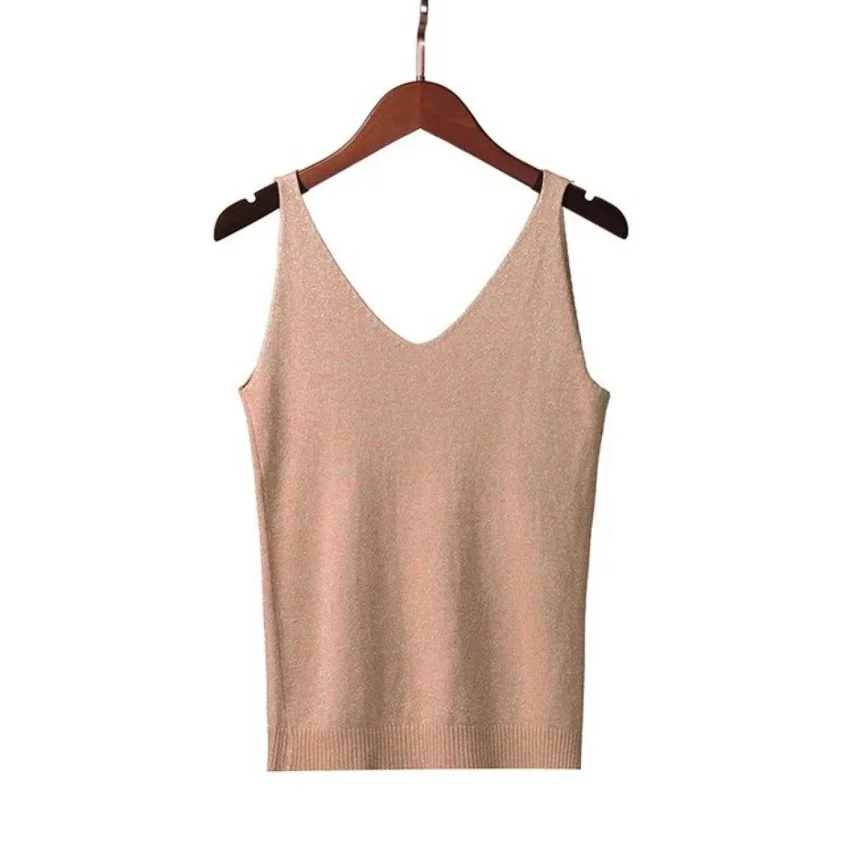 Gilet in maglia brillante da donna con scollo a V estivo alla caviglia che indossa una maglietta senza maniche