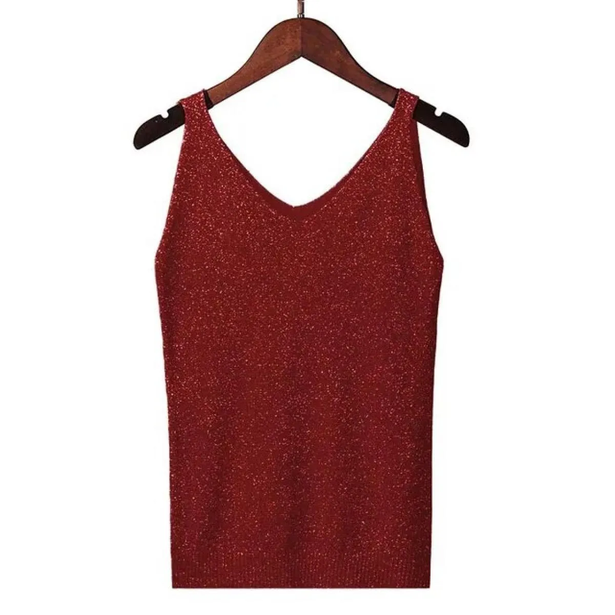 Gilet in maglia brillante da donna con scollo a V estivo alla caviglia che indossa una maglietta senza maniche